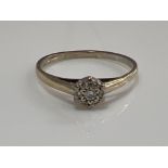 Ladies 18ct white gold diamond cluster ring. 1.4g size N1/2
