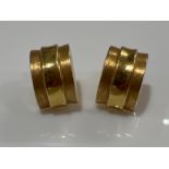 Ladies 18ct gold fancy design earrings. 4.6g