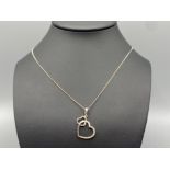 Silver and diamond set heart (0.25 ct) double pendant and silver curb link necklet