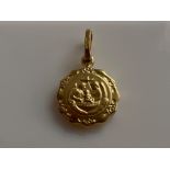 18ct gold religious figure pendant. 1.3G