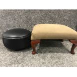 Upholstered footstool with mahogany legs together with leather footstool