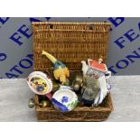 Basket containing saddler tea pot mixed brass ware etc