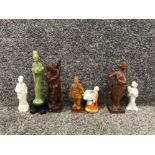 Collection of 7 oriental figurines includes 3 wooden figures 1 resin 3 porcelain