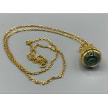 Gold plated and green crystal set ‘Jean Rivers’ collection Quartz movement pendant watch, 36.2g