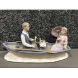 Figure from the leonardo collection man and lady on boat