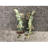 Pair of carved oriental jade like figurines of a man and woman damage repaired