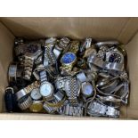 A box lot with misc metal wrist watches