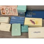 Box containing a quantity of ladies “Estee Lauder” shampoo & makeup sets