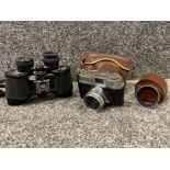 A lot consisting of a pair of Hanimex 8 power Binocular, a Halina 35x vintage camera with