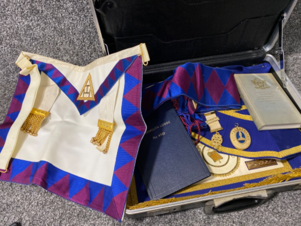 Custom briefcase containing Masonic items including books, aprons, medal & pendant, “Tynemouth