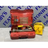 A Hilti TE 14 hammer drill with accessories and drill parts also includes transformer