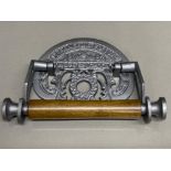 Cast metal St. Pancras toilet roll fixture