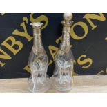 Pair of antique glass glug-glug decanters both with hallmarked Sheffield 1904 silver rims, 1 is