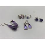 A lot of silver 925 and Amethyst jewellery including dress earrings and rings