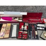 Box lot of miscellaneous items to include novelty feather pen with inkwell, vintage dart sets,
