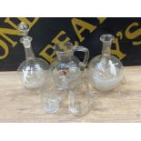 5 pieces of Mary Gregory clear glassware including decanter, bottle & 3 jugs
