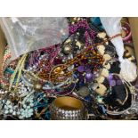 Box containing a large quantity of miscellaneous pieces of costume jewellery, mainly includes