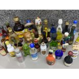 Crate containing a large quantity of alcohol miniatures - many are novelty bottles