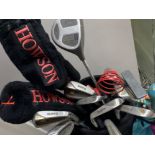 Bag of golf clubs including Hippo irons & Howson Drivers