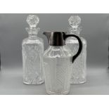 2 good heavy cut whisky decanters and jug