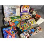 Box containing a variety of vintage board games, Tarzan magazines & model kit etc