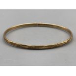 9ct gold bangle with safety catch 2.9g