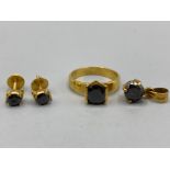 9 low karat set (8ct) Gold includes ring pendant and earrings all with matching stones