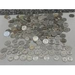 Tub containing a large quantity of coins including USA quarter Dollar & 1 Dime coins etc