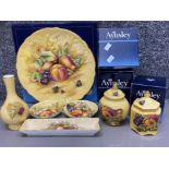 7 pieces of Aynsley “Orchard Gold patterned” collectible items, includes plates, lidded pots & vase