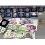 Crate containing cased commemorative coins, old British 1 pound coins & a mixture of bank notes (