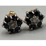 9ct gold diamond & sapphire cluster stud earrings - comprises of 1 diamond surrounded by 8 sapphires