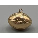 9ct gold hallmarked Rugby ball charm/pendant (.60g)