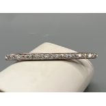 Ladies 18ct white gold diamond bar brooch, comprising of 19 round brilliant cut diamonds (approx