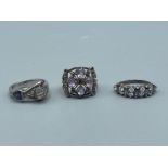 Three Silver & Amethyst rings weighing 16.1 grams, sizes M, Q & R