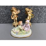 Pair of vintage Fontanini depose Italy cherub cupid figures playing harp & flute, together with a