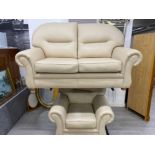 2 and 1 seater cream leather suite