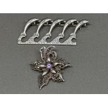 Silver Dolphin brooch and silver, Marcasite & amethyst ‘Flower’ brooch - 12.9G gross