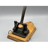 Antique Stolzenberg hole punch on wooden base