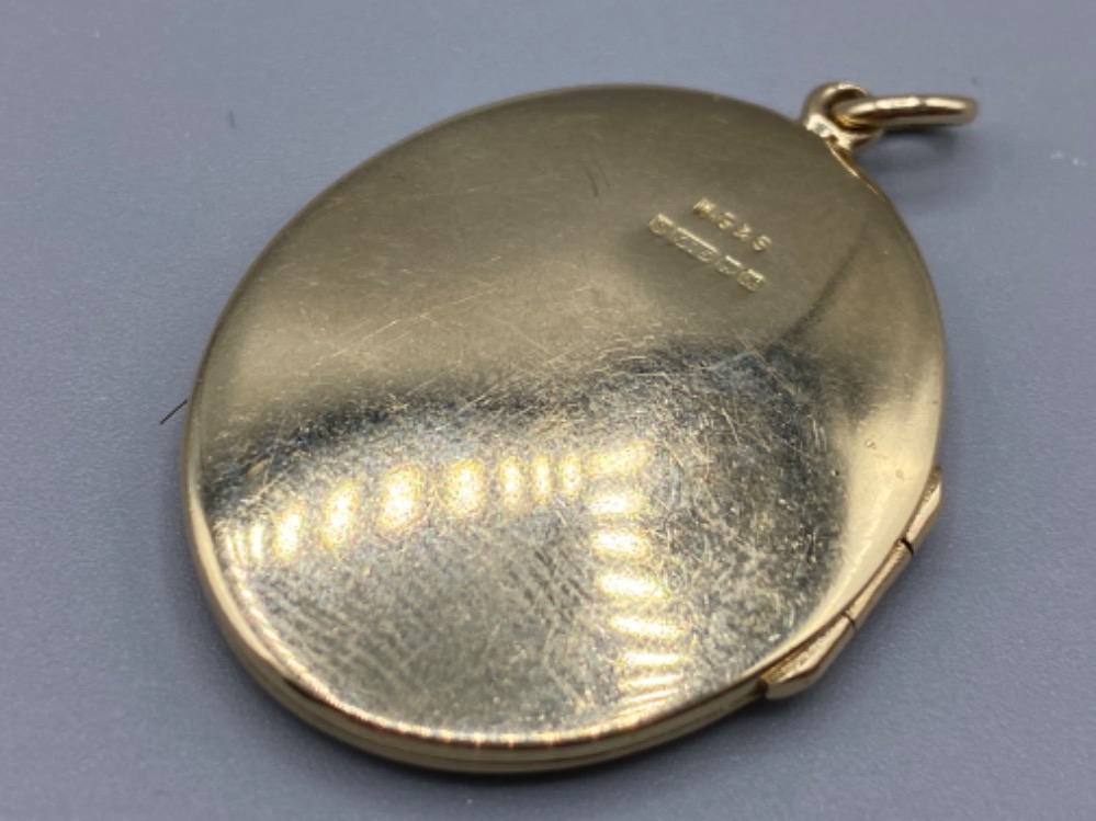 Heavy 9ct gold oval locket pendant (8.67g)