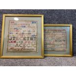 Two framed knitted Alphabet samplers