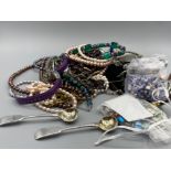 Large lot of costume jewellery and watches also includes 2 silver plated spoons