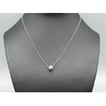 Ladies 18ct white gold diamond pendant with chain (2.71g)