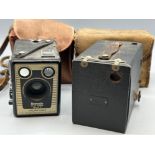 Two vintage cameras includes Brownie six-20 camera model E & Eastman Kodak No120 Brownie box camera,