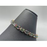 A Stunning 9ct Yellow Gold Mystic Topaz Tennis Bracelet - Weighing 14.18 grams - Measuring 19.5 cm