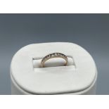 9ct Gold Diamond Eternity Ring - Combined Diamond weight of 0.25cts - Weighing 1.25 grams - Size H