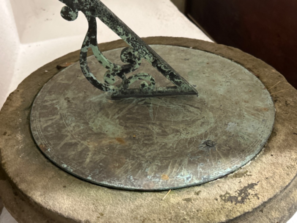 Early 20th century Large outdoor bronze sundial mounted on a heavy circular shaped stone base -