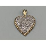 Large 9ct gold diamond heart shaped pendant (4.88g)