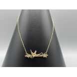 9ct Swallow Brooch on chain - Combined weight of 2.85 grams - Measuring 46cm in length