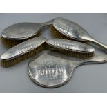 Antique five piece dressing table brush set, all with hallmarked Birmingham silver backs, dated 1919