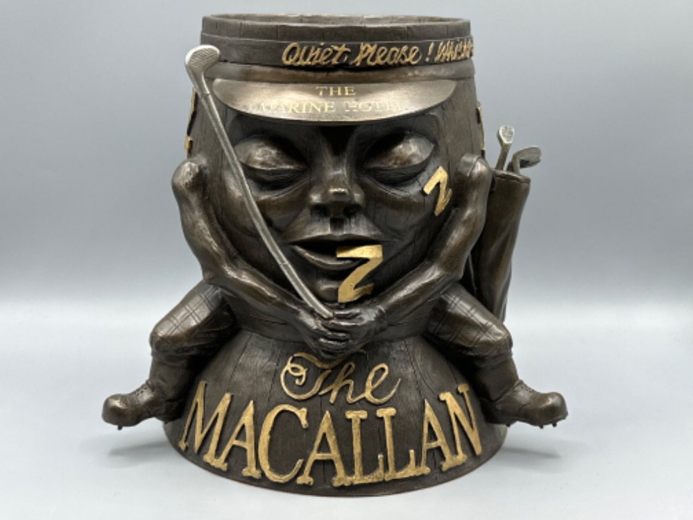 The Macallan sleeping barrel ice bucket, figural golf themed advertising piece, item is embossed